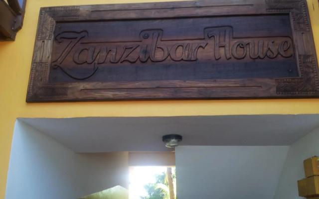Отель Mnarani Beach Cottages