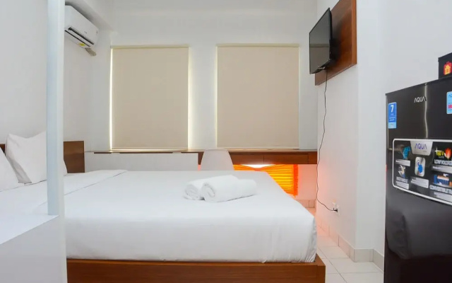 Comfy Studio Room at Patraland Urbano Apartment