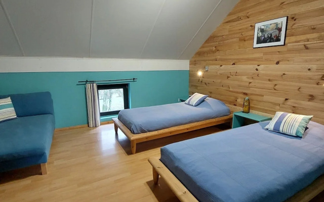 Rustic Holiday Home with Sauna & Hot Tub in Wooded Area