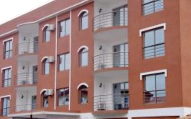 Отель Hilary Hotel Республика Конго, Пойнт-Нуар - отзывы, цены и фото номеров - забронировать отель Hilary Hotel онлайн вид на фасад