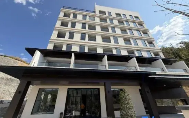 Jiuheyueyuan Wenquan Forest Resort Hotel