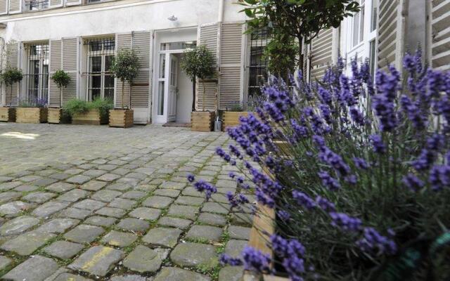 Отель Helzear Montorgueil Suites Франция, Париж - отзывы, цены и фото номеров - забронировать отель Helzear Montorgueil Suites онлайн вид на фасад
