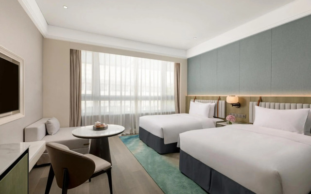 Yuehua Hotel Xiamen Seaside Hotel corridor leads to the stone exhibition hall