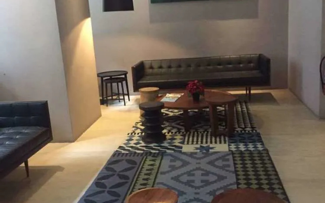 Capsquare Residence