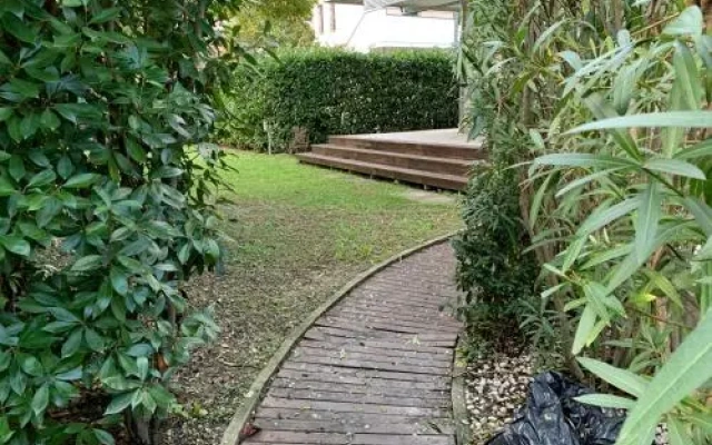 Casa con giardino