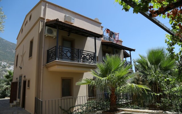 Kalkan Koc Apart Турция, Калкан - отзывы, цены и фото номеров - забронировать отель Kalkan Koc Apart онлайн вид на фасад