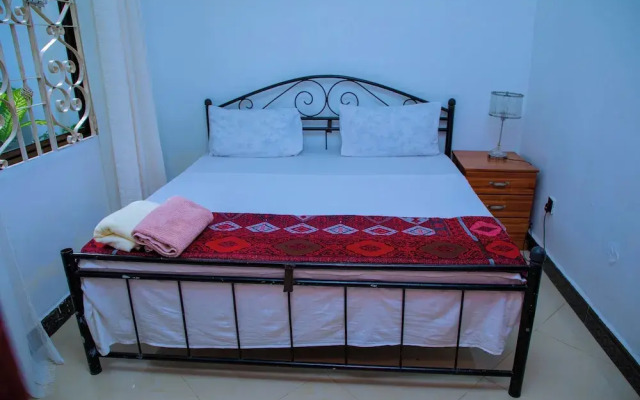 Dar es Salaam-sleeps8-parking-garden-pet Friendly