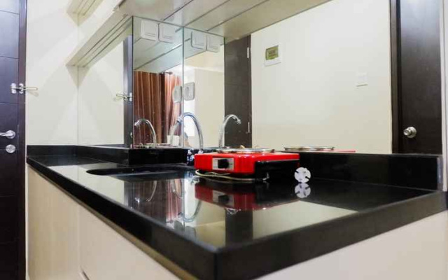 Elegant Studio Room Apartment at Tamansari Papilio By Travelio