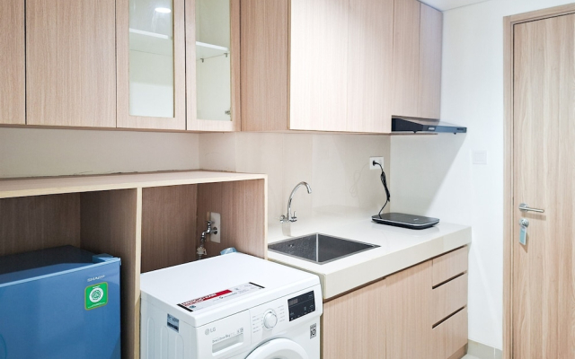 Wooden Accents 1Br Without Living Room At Bintaro Embarcadero Apartment