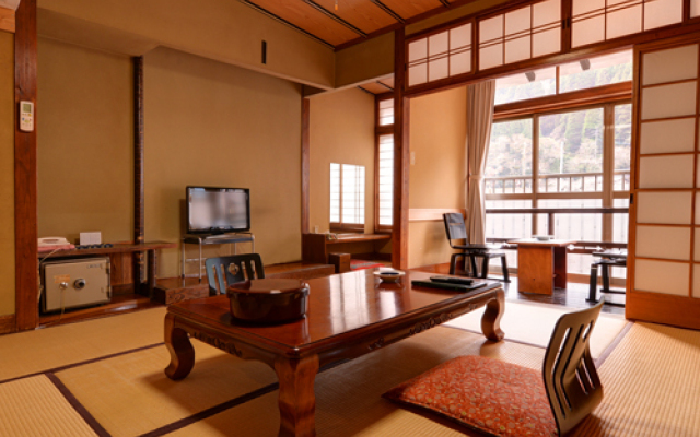 Отель Tsuetate Onsen Izumiya Минамиогуни комната для гостей