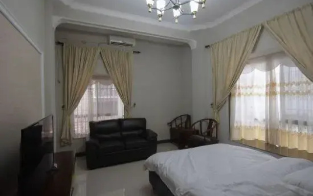 Dongxing Guomen e Homestay