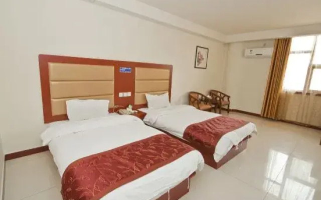 Yinan Xinxing Hotel