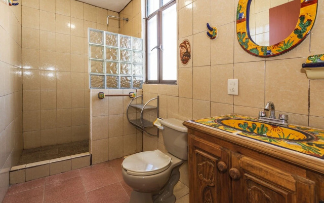Capital O Las Calzadas Hotel & Suites