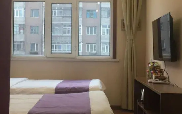 Xinyue Hotel (Mudanjianghuochebeizhanxinhualudian)