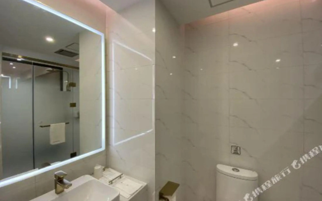 7 Days Premium Hotel (Fenggang Yongsheng Street New High Plaza Branch)