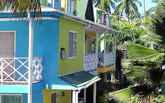 Отель Cocoplum Beach Колумбия, Сан-Луис - 1 отзыв об отеле, цены и фото номеров - забронировать отель Cocoplum Beach онлайн вид на фасад