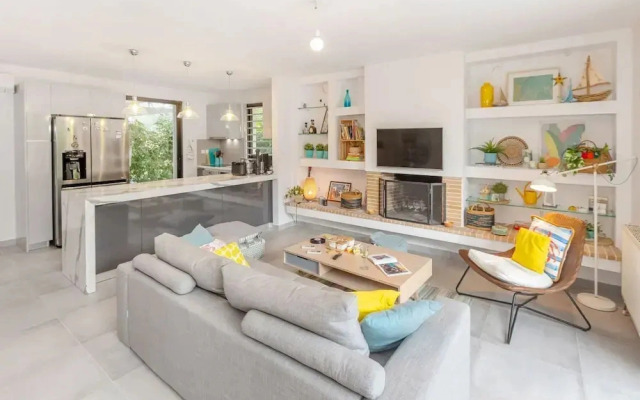 Private Garden Duplex in Voula by GHH