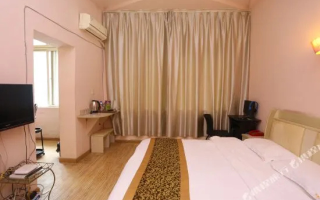 Kuaile Yijia Business Hotel