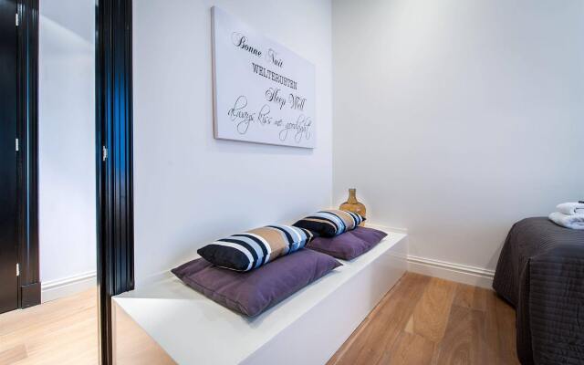 Апартаменты Tropen Apartments комната для гостей