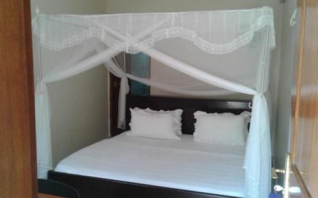 Отель Sandton Kasese Уганда, Национальные парки западной Уганды - отзывы, цены и фото номеров - забронировать отель Sandton Kasese онлайн комната для гостей
