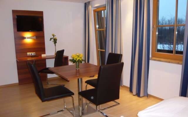 Boutique Hotel & Apartments Am Essigmanngut Аниф комната для гостей
