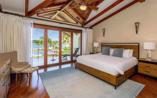 Stylish Split-Level Condo with a Shaded Terrace, Direct Beach Access, and Resort-Style Community Amenities