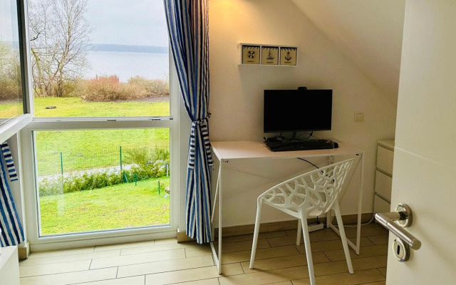 Ferienhäuser mit Seeblick direkt am Plauer See