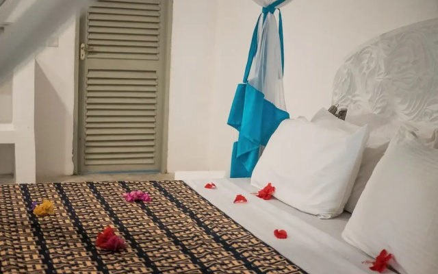 Neema Barefoot Beach House