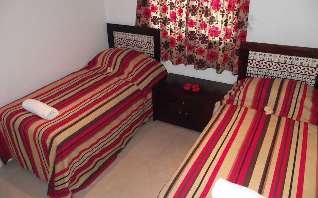 Апартаменты Hibiscus Apartments Fiji комната для гостей