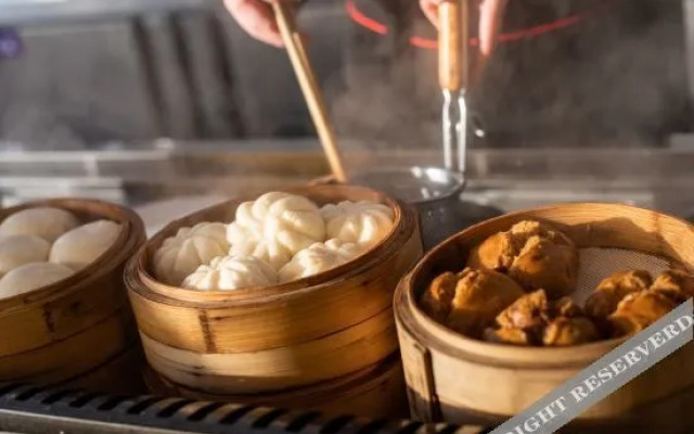 Отель Dongying Plaza Le Peng