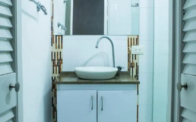 Apartamento con playa privada y piscina