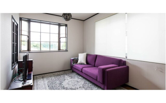 Purple Sofa House 2