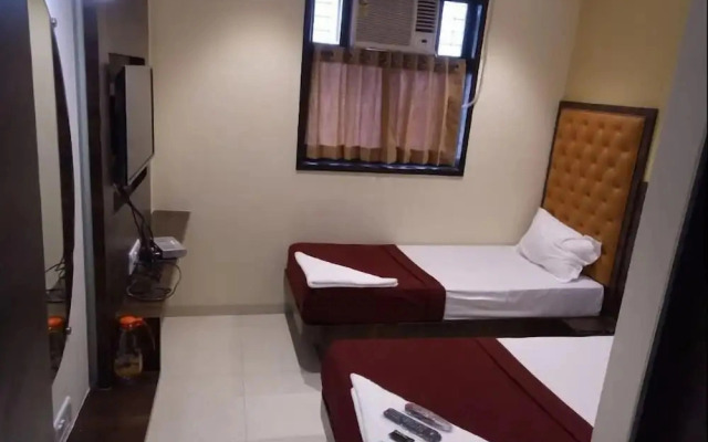 Fabhotel New Silver Elite