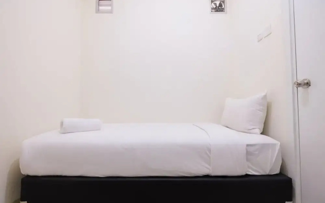 2 Bedrooms at Green Pramuka City Apartment By Travelio