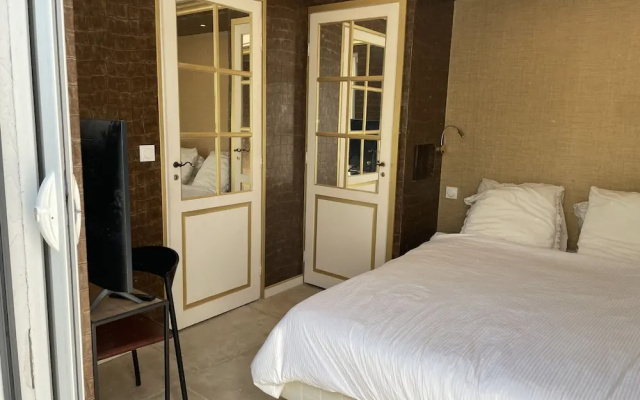 Chambre Luxe Piscine Jardin vue Solarium Palmeraie