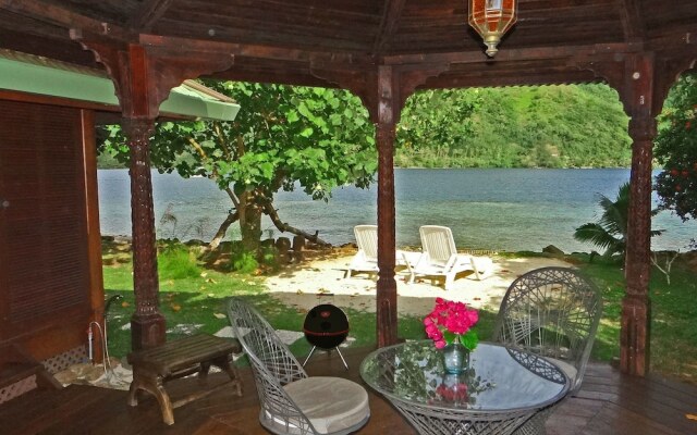 Отель Robinson's Cove Villas вид на фасад