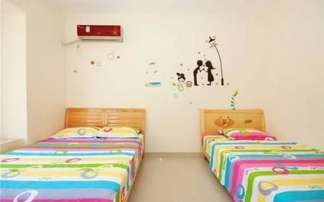 Huanyuanlanwan Holiday Hotel(花园蓝湾度假屋(三亚大东海店))