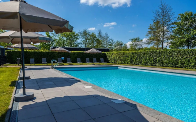 Nice Chalet Near the Golf Course in a Holiday Park