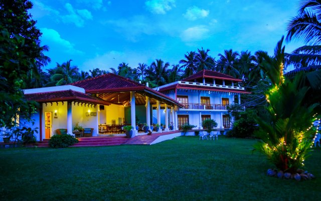 Отель Waterside Bentota Шри-Ланка, Бентота - отзывы, цены и фото номеров - забронировать отель Waterside Bentota онлайн вид на фасад