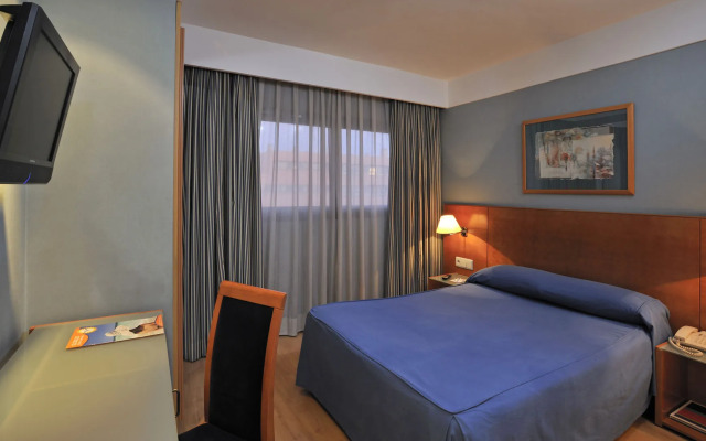 Отель Sercotel de los Reyes