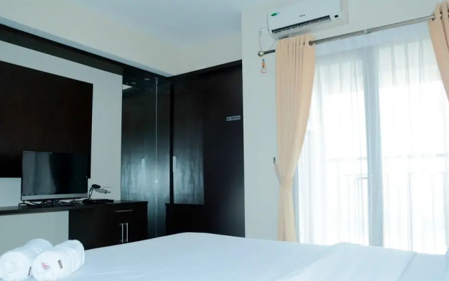 Simply Studio Room Atria Residence Apartment near Summarecon Mall By Travelio