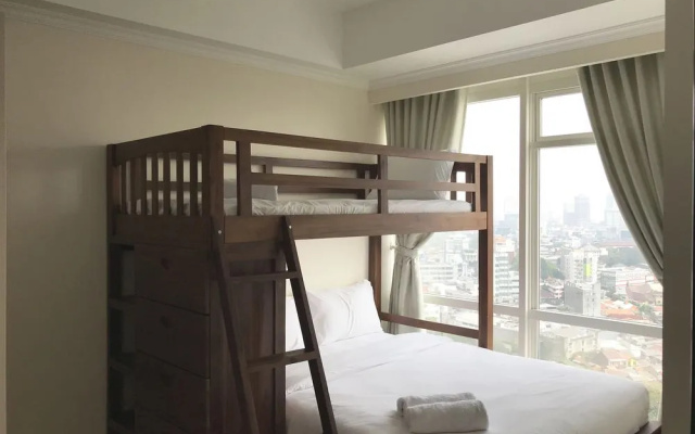 Luminous 2 Bedrooms at Menteng Park Apartment by Travelio