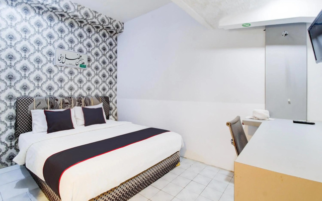 Hotel O Jalan Jenderal Sudirman Near Imam Bonjol Square Formerly Nelvi Guest House