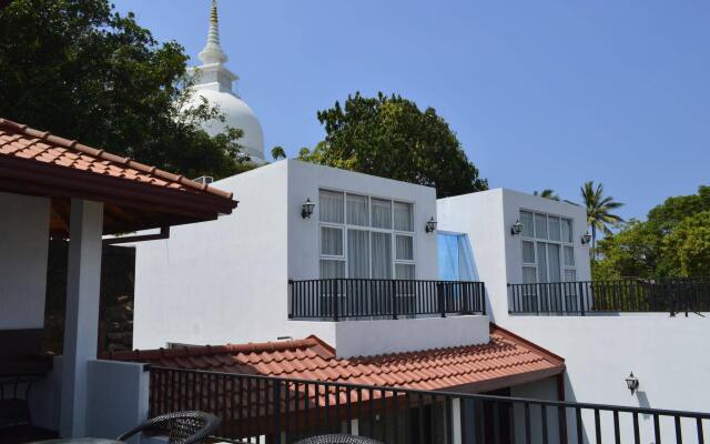 Отель Villa Baywatch Rumassala вид на фасад