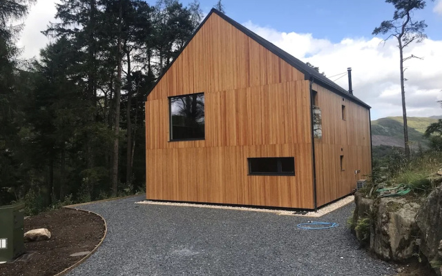 An Caisteal Lodge With Cascading Waterfall View