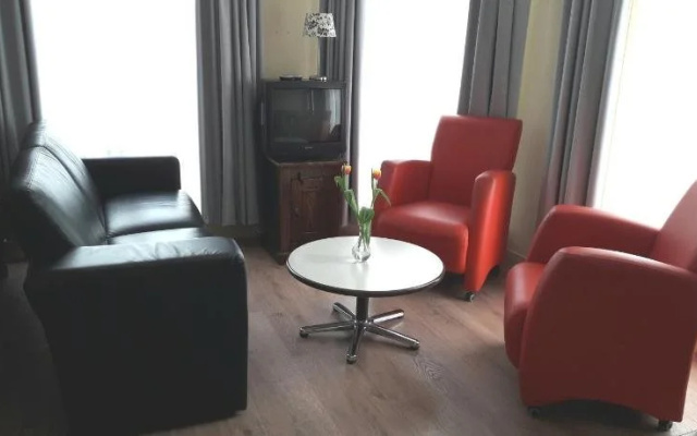 Logement De witte klok