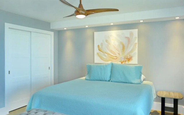 Elegant Beachfront Condo in Private Community