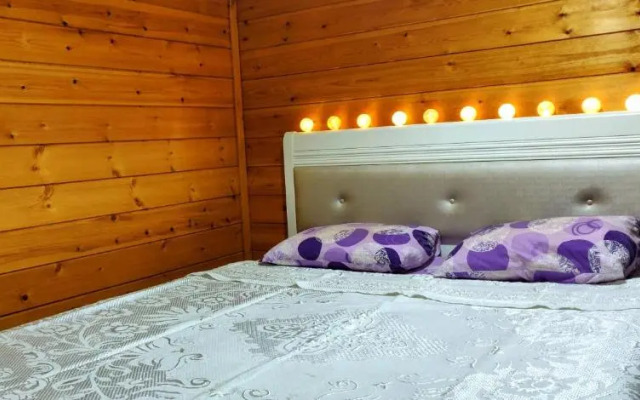 Ikos Olympus - Elegant wooden cabin house near the beach