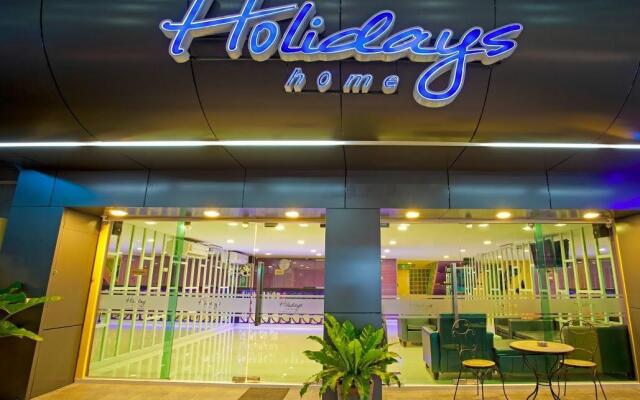 Отель Holidays Home вид на фасад