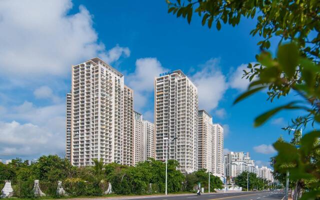 Апартаменты Sanya Qingjinghaiwan Apartment вид на фасад